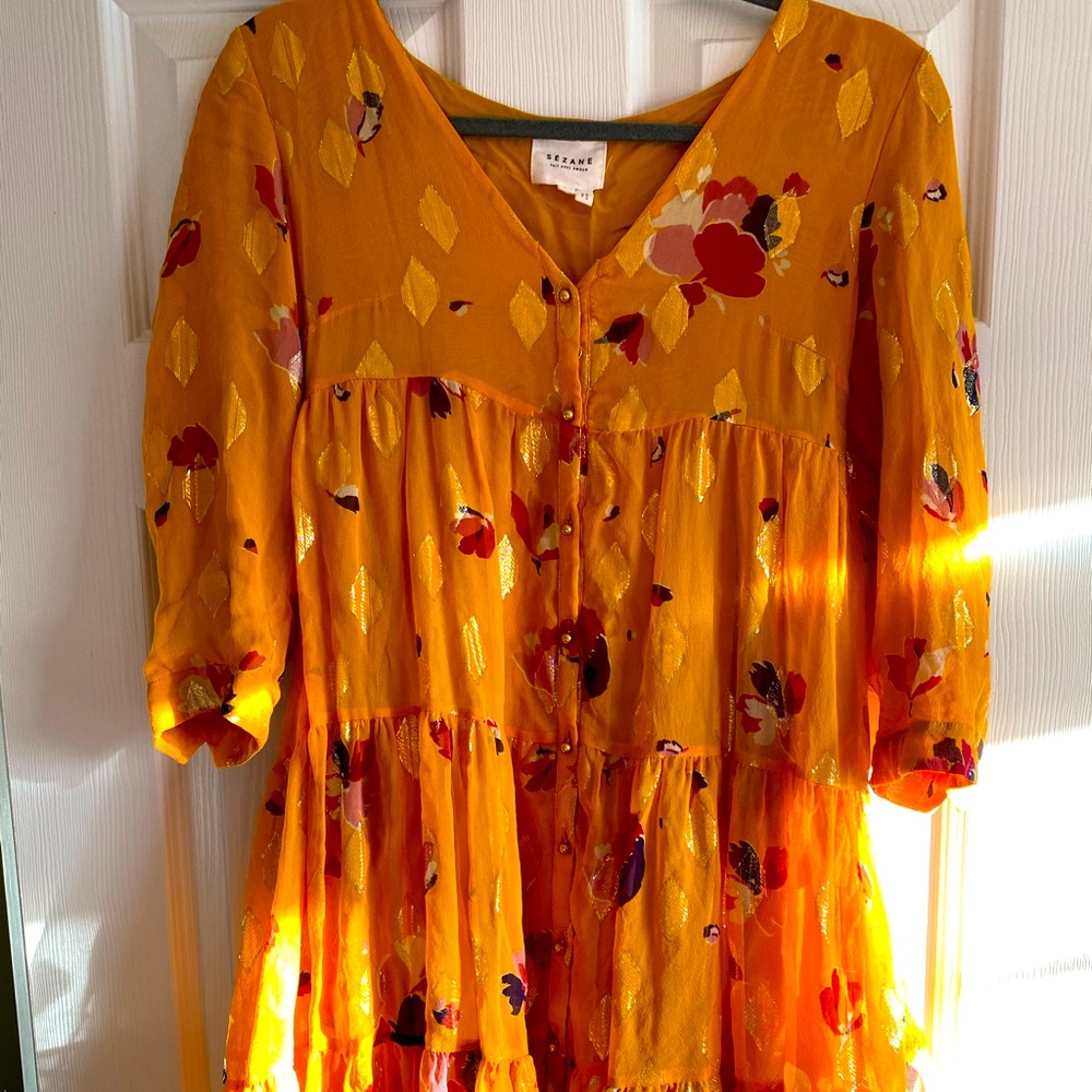 Gold shirt dress.